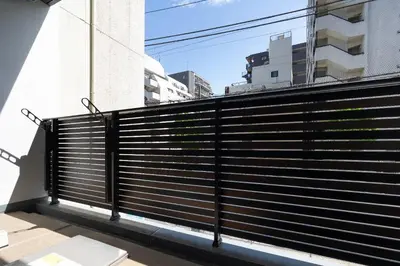 a fence on the side of a building at MAT Ryogoku in Tokyo