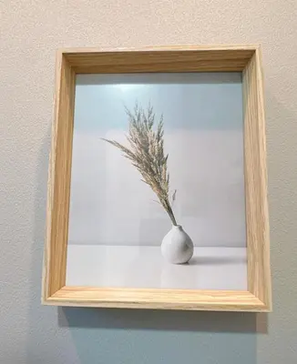a mirror with a vase with a plant in it at \u6771\u4eac\u30b9\u30ab\u30a4\u30c4\u30ea\u30fc\u30cf\u30a6\u30b9JoY in Tokyo