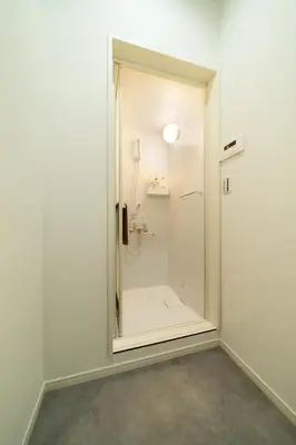 a bathroom with a shower with a glass door at 98, Higashi-tateishi A 1st floor of the apartment, \u6771\u7acb\u77f3A 1F in Tokyo