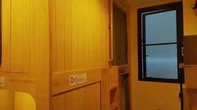 a room with a door and a window in it at \u65e5\u672c\u30ef\u30a4\u30f3\u30d0\u30c3\u30af\u30d1\u30c3\u30ab\u30fc\u30ba in Tokyo