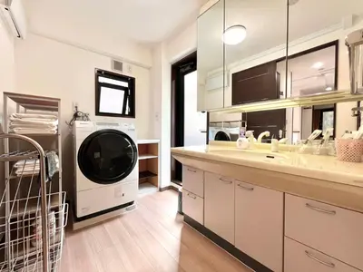 a kitchen with a washer and dryer in it at EV-Akabane House-KI0414 in Tokyo