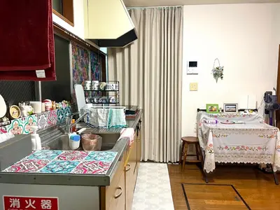 a kitchen with a sewing room with a table at Sakura Bloom Separate House in Tokyo