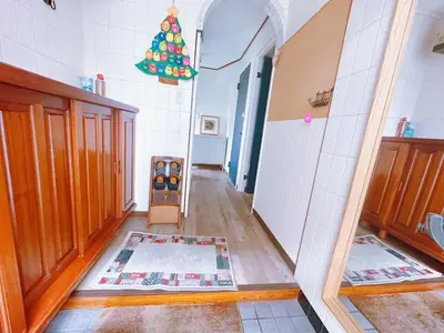 a hallway of a kitchen with a christmas tree at \u4e00\u68df\u8cb8\u3057\u5e83\u300570\u5e73\u7c73 \u8cb4\u9802\u5e9c\u90b8 \u897f\u65b0\u4e95 KICYO HOUSE No2 in Tokyo