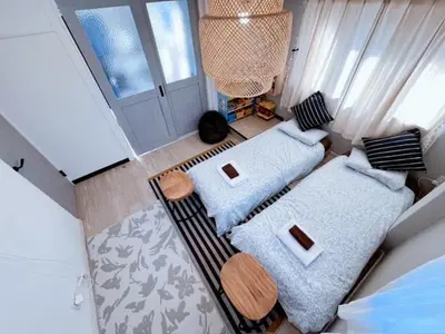 an overhead view of a living room with two couches at \u4e00\u68df\u8cb8\u3057\u5e83\u300570\u5e73\u7c73 \u8cb4\u9802\u5e9c\u90b8 \u897f\u65b0\u4e95 KICYO HOUSE No2 in Tokyo