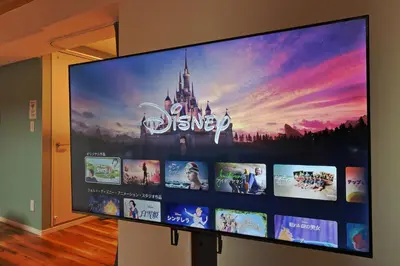 a large flat screen tv with a disney movie on it at V Close to Shinjuku Kabukicho Korean Town FrWIFI F in Tokyo