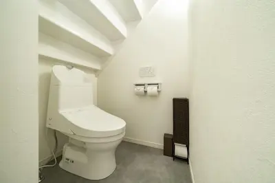 a bathroom with a white toilet in a room at 99, Higashi-tateishi A 2nd and 3rd floor apartment, \u6771\u7acb\u77f3A 2F,3F in Tokyo