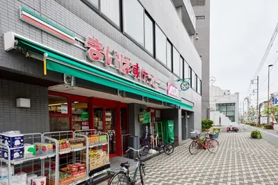 a store with bikes parked outside of it on a street at \u30b0\u30ed\u30fc\u30d9\u30eb \u30b6 \u30af\u30ec\u30b9\u84b2\u7530 in Tokyo