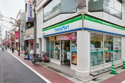 a store front of a building on a city street at \u30b0\u30ed\u30fc\u30d9\u30eb \u30b6 \u30af\u30ec\u30b9\u84b2\u7530 in Tokyo