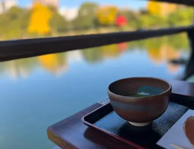 a brown bowl sitting on a tray on a table at Tokyo villa Ryogoku in Tokyo