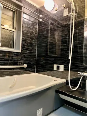 a bathroom with a bath tub and a shower at CoreHOTEL in Tokyo