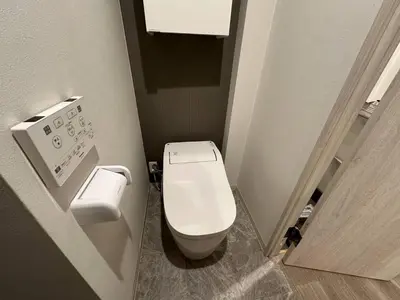 a small bathroom with a toilet in a stall at 5minutes from Shinjuku Shin-Okubo Station-k101 in Tokyo