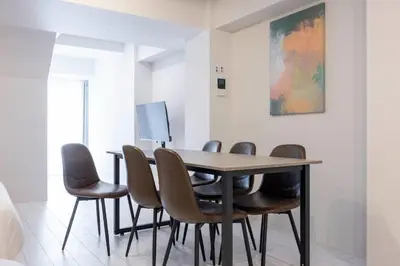 a meeting room with a table and chairs at APRO Stay \u54c1\u5ddd in Tokyo