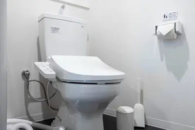 a bathroom with a white toilet in a room at APRO Stay \u54c1\u5ddd in Tokyo