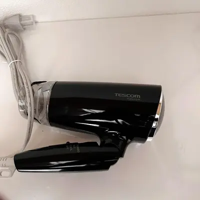 a bottle of wine in a wine rack at Lucky House\u65b0\u5bbf21 in Tokyo
