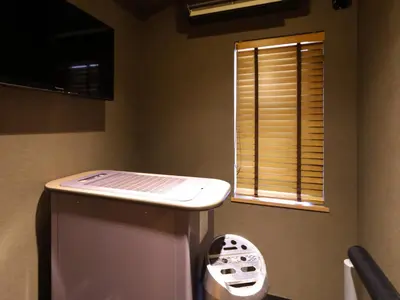 a bathroom with a sink and a window at Dormy Inn Ueno Okachimachi in Tokyo