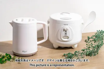a toaster and a blender on a table at \u30a2\u30fc\u30d0\u30f3\u30d1\u30fc\u30af\u672c\u6240\u543e\u59bb\u6a4b in Tokyo