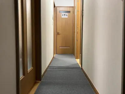 an empty hallway with a door and a carpet at Entire Hotel Beside Asakusa, Ueno, Akihabara and Tokyo Skytree tower between 3 Train Stations and Contains 3 Bedrooms, 2 Bathrooms and 2 toilets for 14 guests in Tokyo