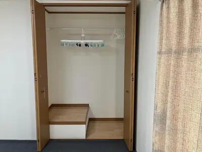 a room with a closet with a mirror and a curtain at Entire Hotel Beside Asakusa, Ueno, Akihabara and Tokyo Skytree tower between 3 Train Stations and Contains 3 Bedrooms, 2 Bathrooms and 2 toilets for 14 guests in Tokyo