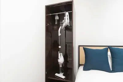 a bedroom with a bed with a black head board at Contel\u660e\u5927\u524d in Tokyo
