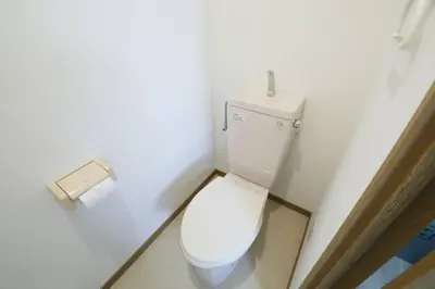 a bathroom with a toilet and a roll of toilet paper at Voere\u5927\u4e95\u753a 302 in Tokyo