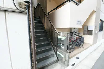 a staircase in a building with bikes parked next to it at Voere\u5927\u4e95\u753a 302 in Tokyo