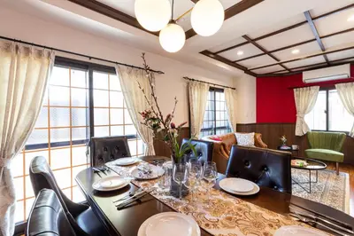 a dining room with a table and chairs at IROHA STAY HANEDA - Family-Friendly Home Stay near Haneda with Great Access to Tokyo & Yokohama in Tokyo