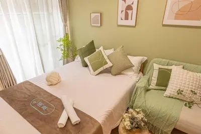 a bed with a cross on it in a room at 3mins from Nakano subway,Direct to Shinjuku,Up to 4 People in Tokyo
