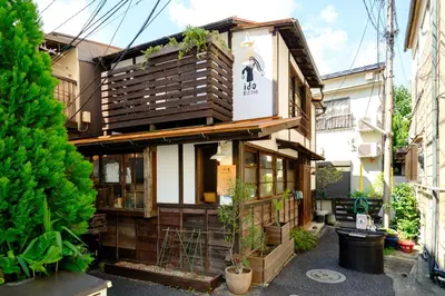 a building with a sign on the side of it at \u30bb\u30f3\u30c8\u30ec\u6cb3\u7530\u753a in Tokyo