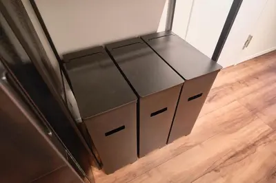 a group of four boxes sitting on a floor at TOMARIE Residential Suite Kita-Senju in Tokyo