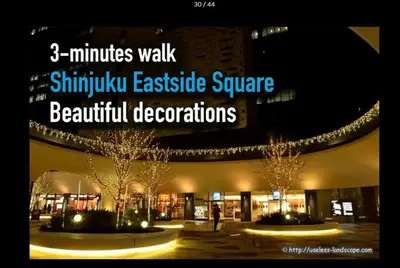 a sign for a building with lights on it at New Open\u6771\u65b0\u5bbf \u6238\u5efa in Tokyo