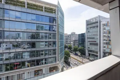 an office building with a view of a city at \u5357\u9752\u5c71227\u30d3\u30eb in Tokyo