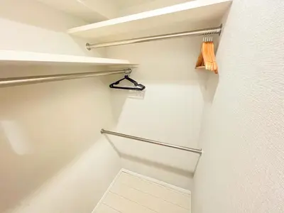 a bathroom with a walk in closet with a towel rack at Shinjuku Downtown BZT Free WiFi in Tokyo