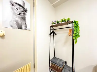 a bathroom with a cat on the wall at Shinjuku West Cozy WZE Free WiFi in Tokyo