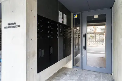 a wine cellar with a glass door in a building at Lega land\u4e2d\u91ce\u5bcc\u58eb\u898b\u753a in Tokyo
