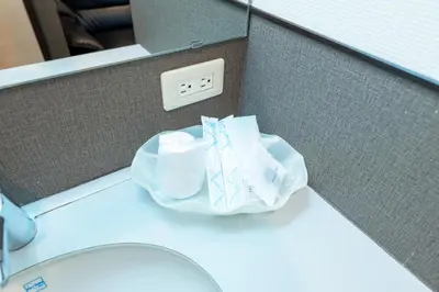 a bathroom counter with a toilet and an electrical outlet at Hotel Grand Fort - Vacation STAY 19307v in Tokyo