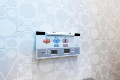 an electronic device hanging on a wall at Hotel Grand Fort - Vacation STAY 19307v in Tokyo