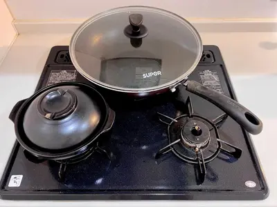 a pot sitting on top of a stove at High-end Tokyo shinjuku Central Park Flat 2 in Tokyo