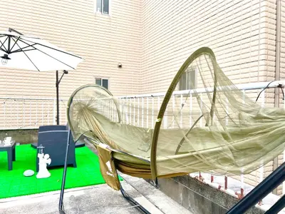 a slide on a porch with an umbrella at \u5927\u4e45\u4fdd4\u5206\u65b0\u5927\u4e45\u4fdd8\u5206\u30c6\u30e9\u30b9\u4ed8\u304d in Tokyo
