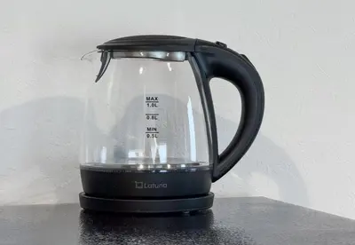 a black blender sitting on top of a table at \u4ee3\u3005\u6728\u4e0a\u539f in Tokyo
