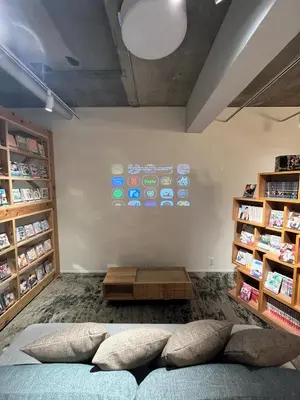 a room with a bed and a wall with icons on it at MANGA ART HOTEL, BAKUROCHO - Vacation STAY 24887v in Tokyo