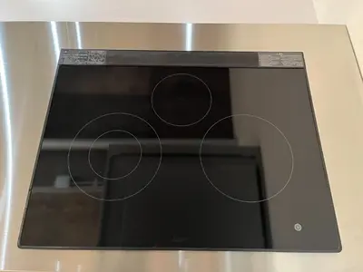 a microwave oven with a black window in it at MANGA ART HOTEL, BAKUROCHO - Vacation STAY 24887v in Tokyo