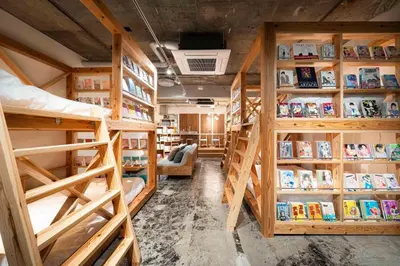 a room filled with lots of bunk beds at MANGA ART HOTEL, BAKUROCHO - Vacation STAY 24863v in Tokyo