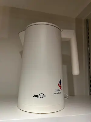 a white toaster sitting on top of a counter at MANGA ART HOTEL, BAKUROCHO - Vacation STAY 14217v in Tokyo