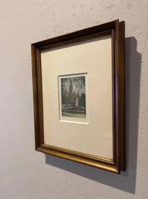 a picture frame hanging on a wall at \u30a2\u30f3\u30c9\u30b9\u30c6\u30a4\u84b2\u75301\u4e01\u76ee in Tokyo