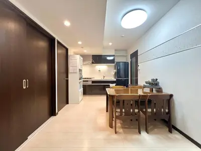 a kitchen and dining room with a table and chairs at Ikebukuro 606 -TS0043 in Tokyo