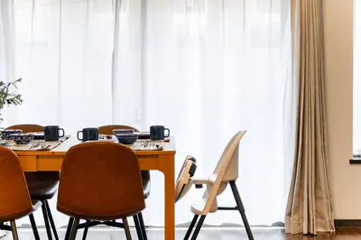 a dining room with a table and chairs at Villa mitamura 303 VM33 in Tokyo