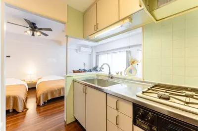 a kitchen with a sink and a stove at Villa mitamura 303 VM33 in Tokyo