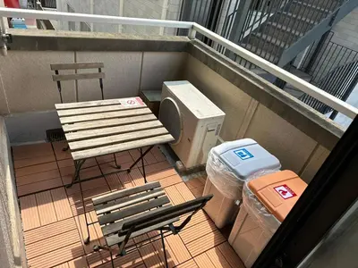 a balcony with a bench and a trash can at Belmont 303 3min to Station Easy Access Ueno Asakusa Skytree Sleeps 4 in Tokyo