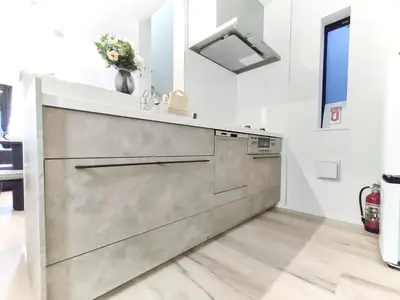a kitchen with a stainless steel counter top at \u65b0\u5bbf2\u7ad9 \u6c60\u888b\u5168\u65b0\u72ec\u7acb3\u5c42\u522b\u5885 3\u5ba41\u53851\u6d74\u5ba4 \u6700\u59278\u4eba max 8P \u8f66\u7ad97\u5206\u949f 7mins to ST \u94f6\u5ea7 \u65b0\u5bbf \u6d89\u8c37 \u6c60\u888b \u4e1c\u4eac\u76f4\u901a in Tokyo