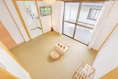 an overhead view of a room with a table and a window at sunrise 2 in Tokyo